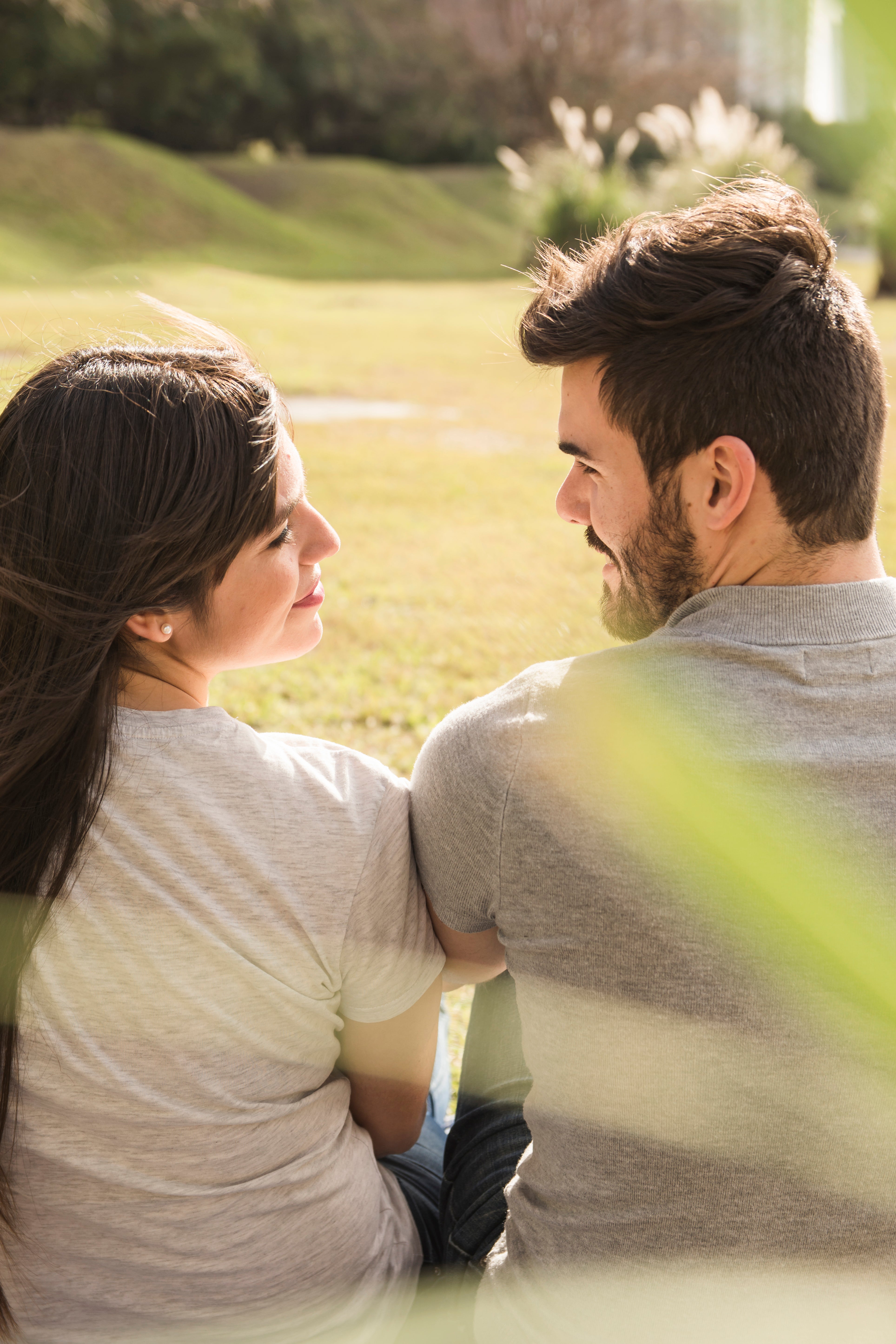 smiling-loving-young-couple-looking-each-other-park.jpg
